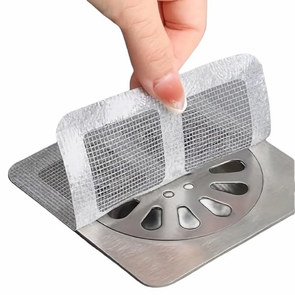 Disposable shower drain cover hair catcher
